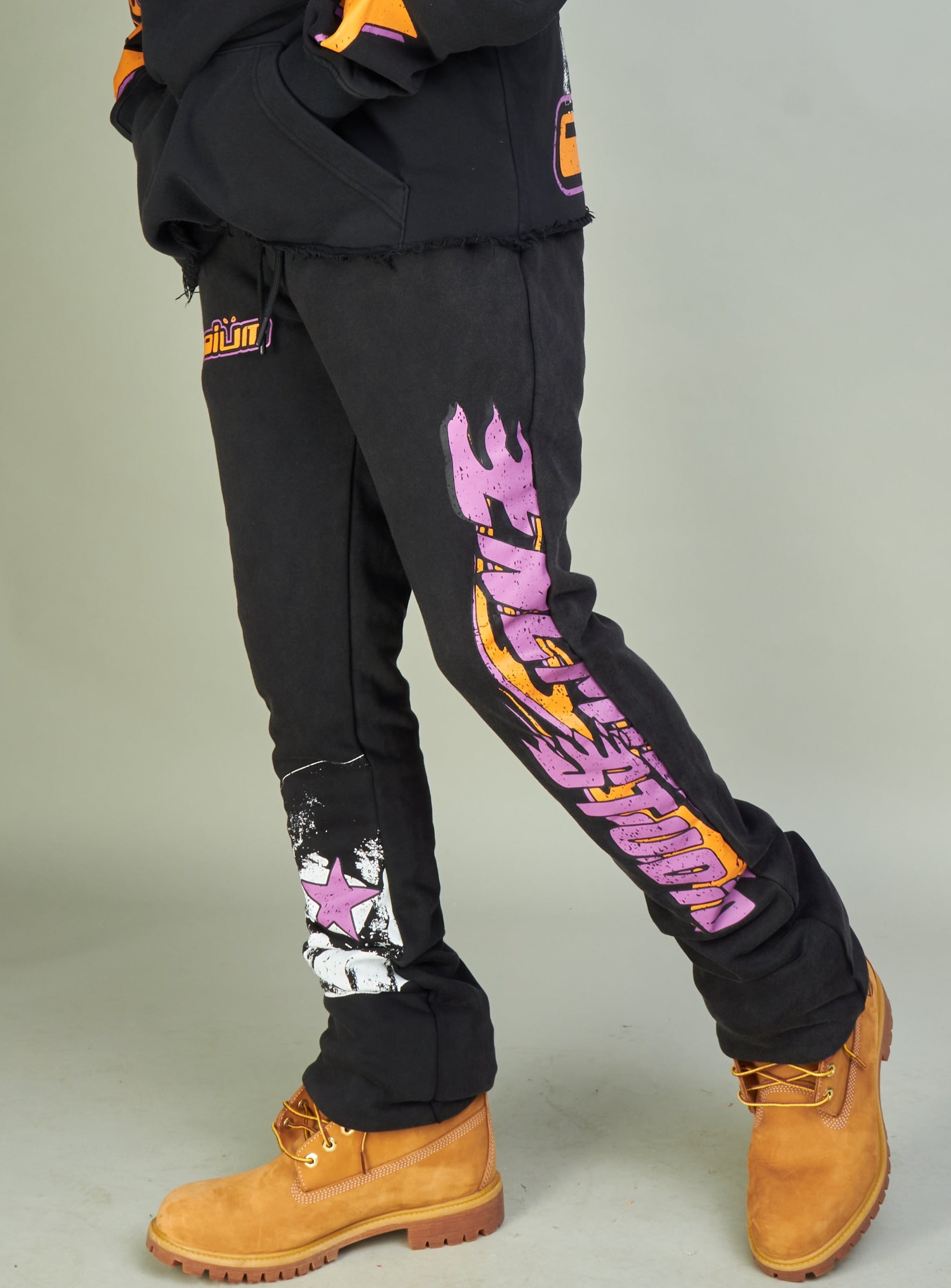 NME Sweatpants - NME Studio - Black And Orange