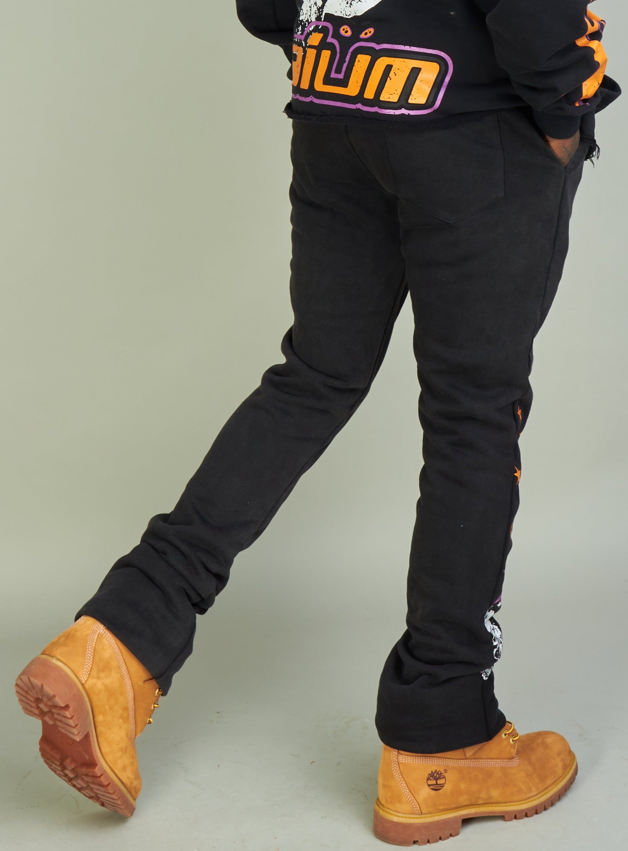 NME Sweatpants - NME Studio - Black And Orange